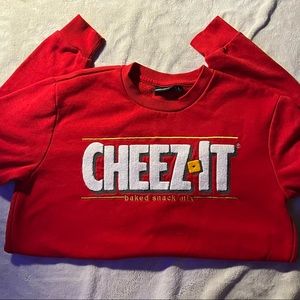 Red cheez it sweater